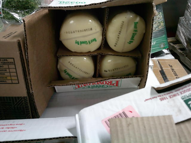Box of four provolone cheeses.